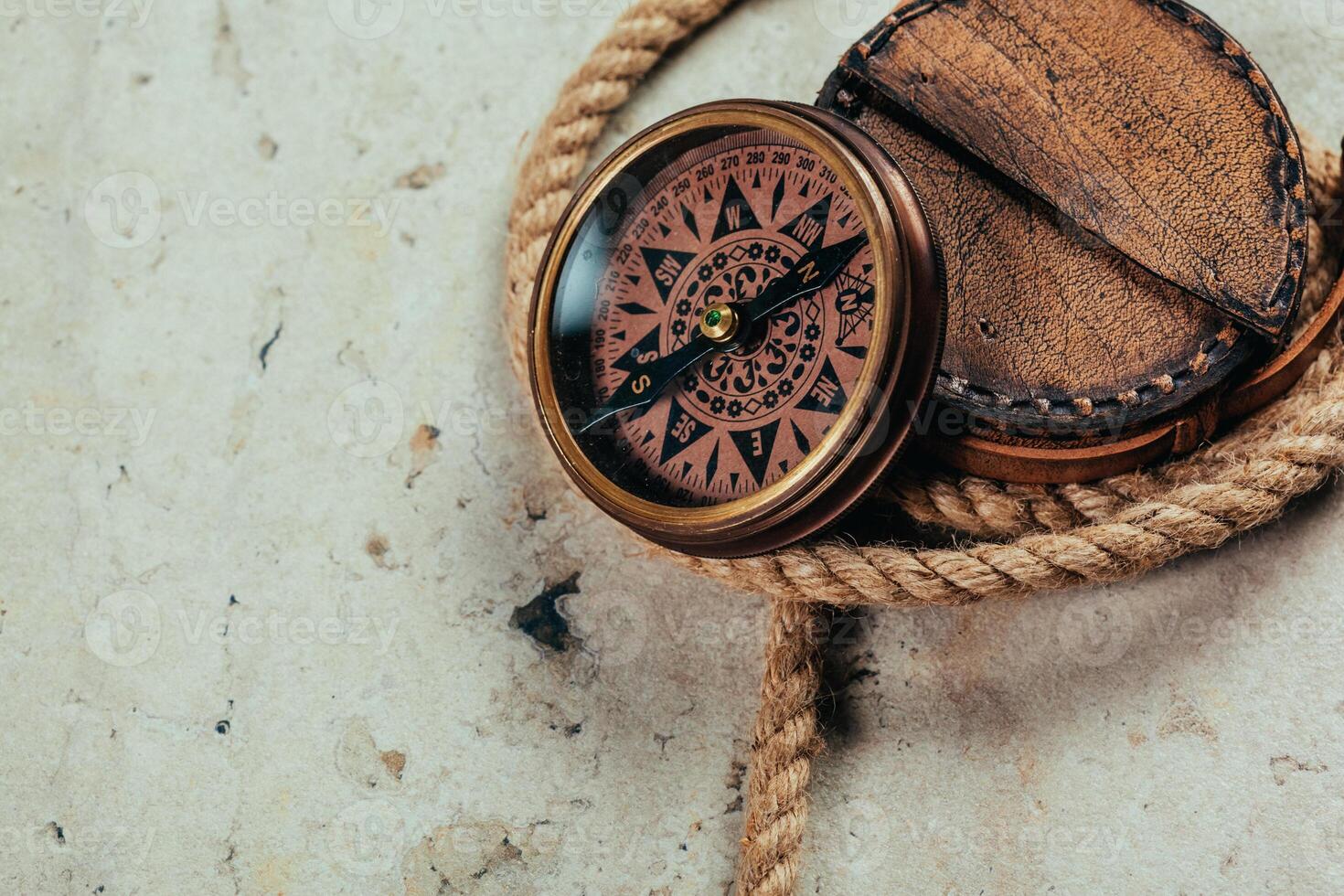 Compass on a gray gradient background photo
