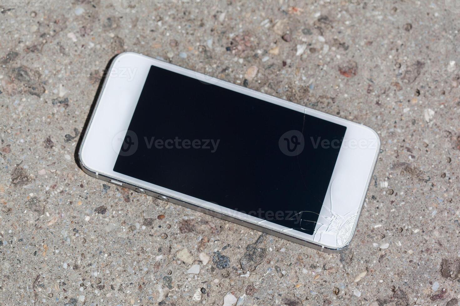 Smartphone drop to the floor and screen damage photo