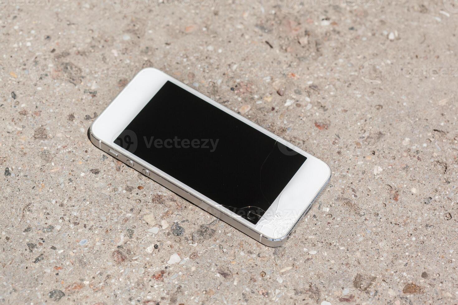 Smartphone drop to the floor and screen damage photo