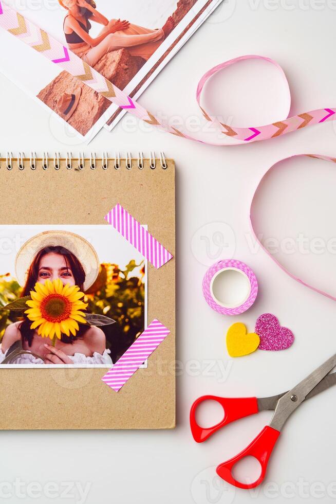 Creative crafting with a photo album and colorful materials for personal memories