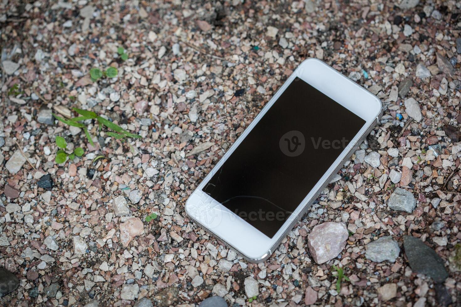 Smartphone drop to the floor and screen damage photo
