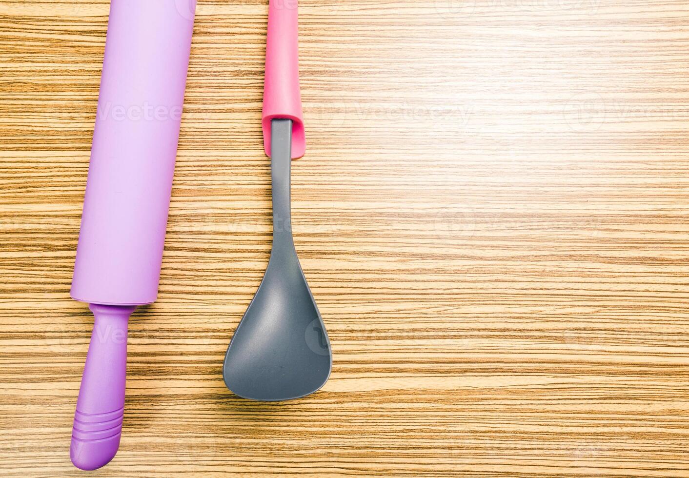 kitchenware on wooden background photo