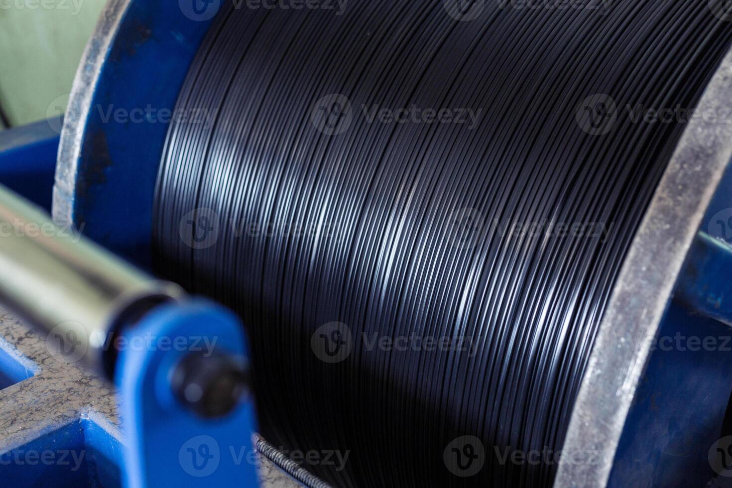 Fragment inside a modern plant producing power electric cable and optical fiber. photo