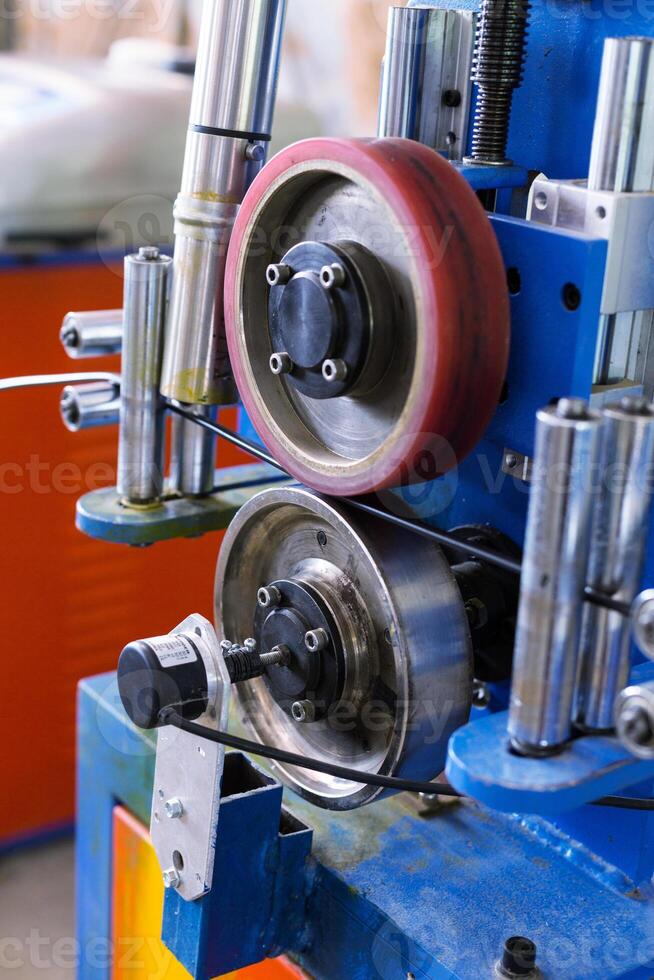 Inside the old factory manufacturing electrical cable. photo