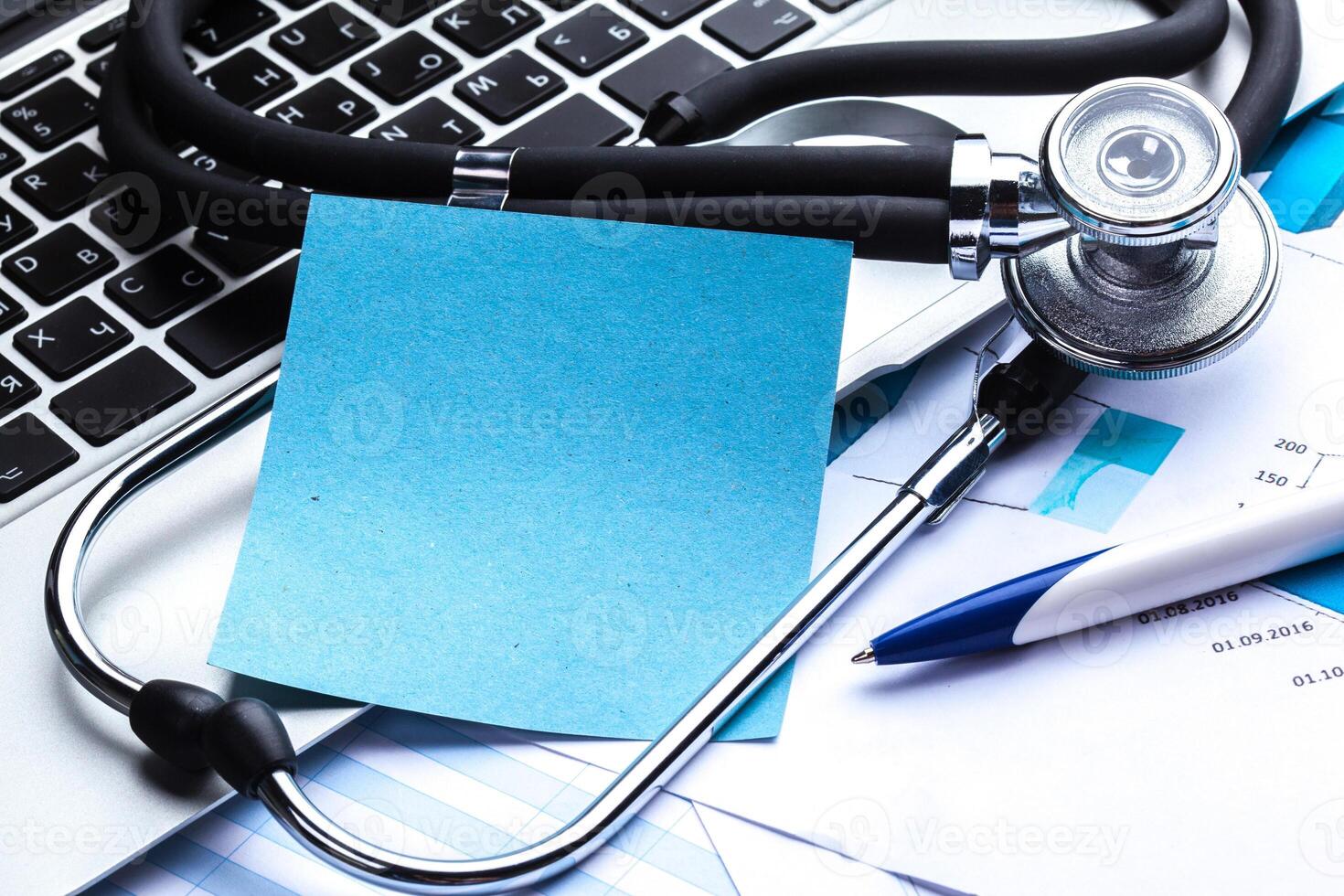 Medical stethoscope on computer keyboard photo