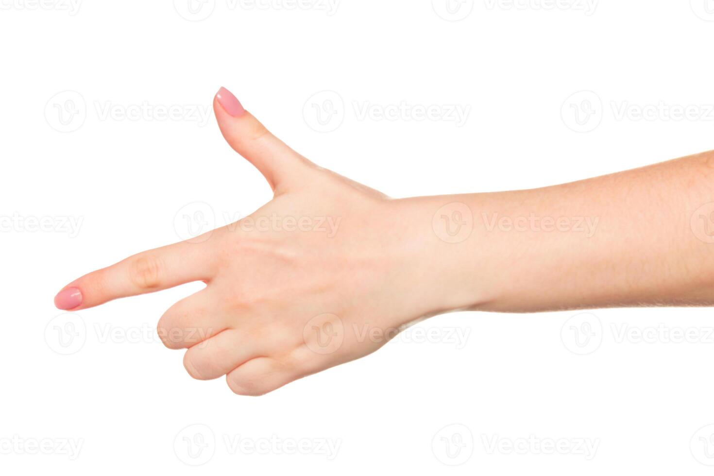 Hand gesture mimicking a gun takes center stage in a light setting during a creative exploration of body language photo