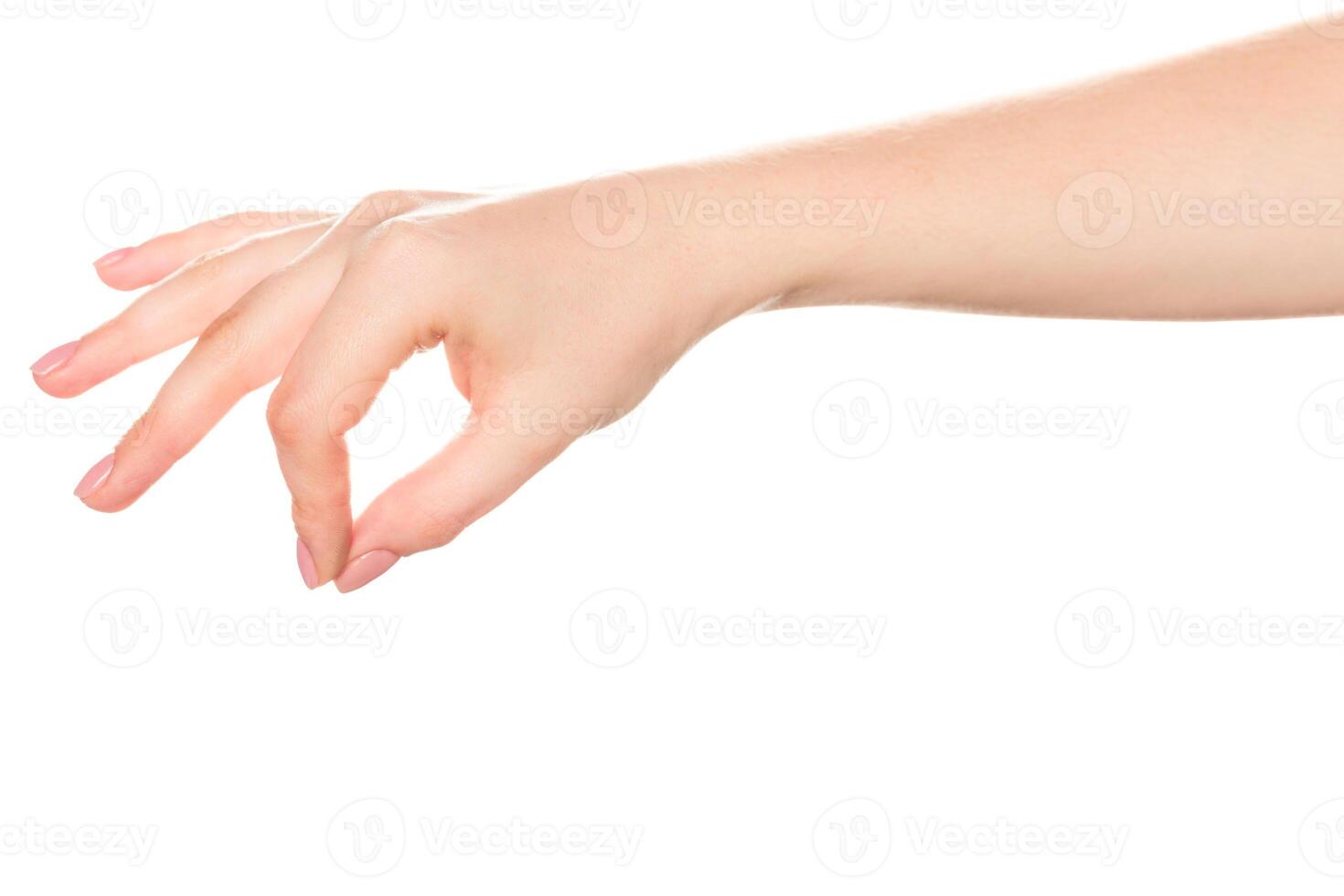 Elegant hand gesture reaching out with fingers poised in a delicate manner during a serene moment photo