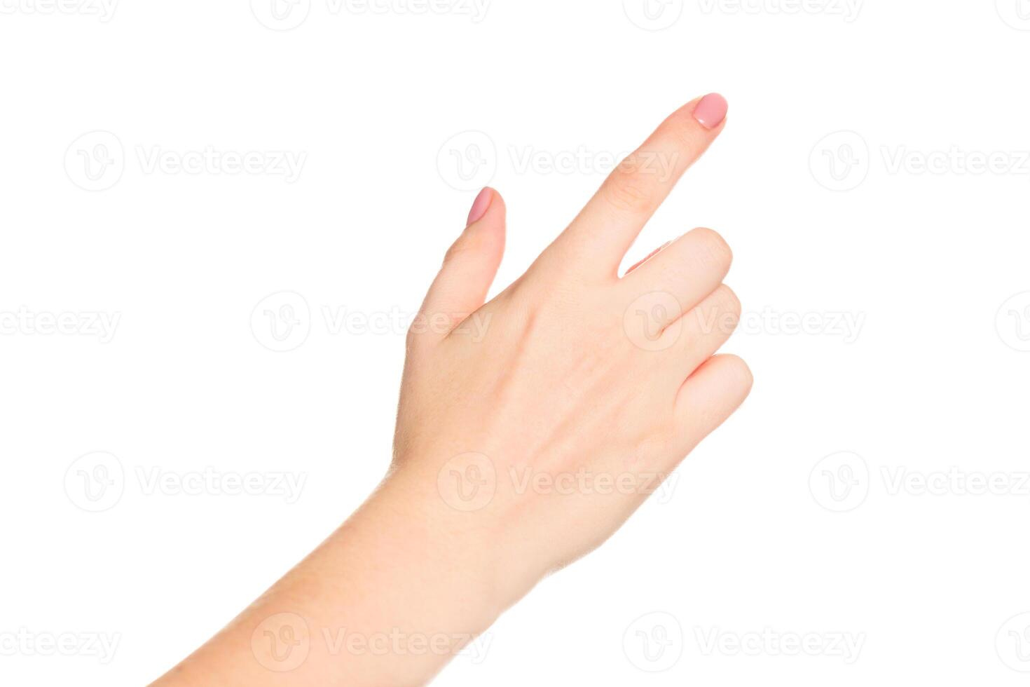 Hand pointing towards an unseen direction against a plain white background, illustrating gestures of communication or direction photo