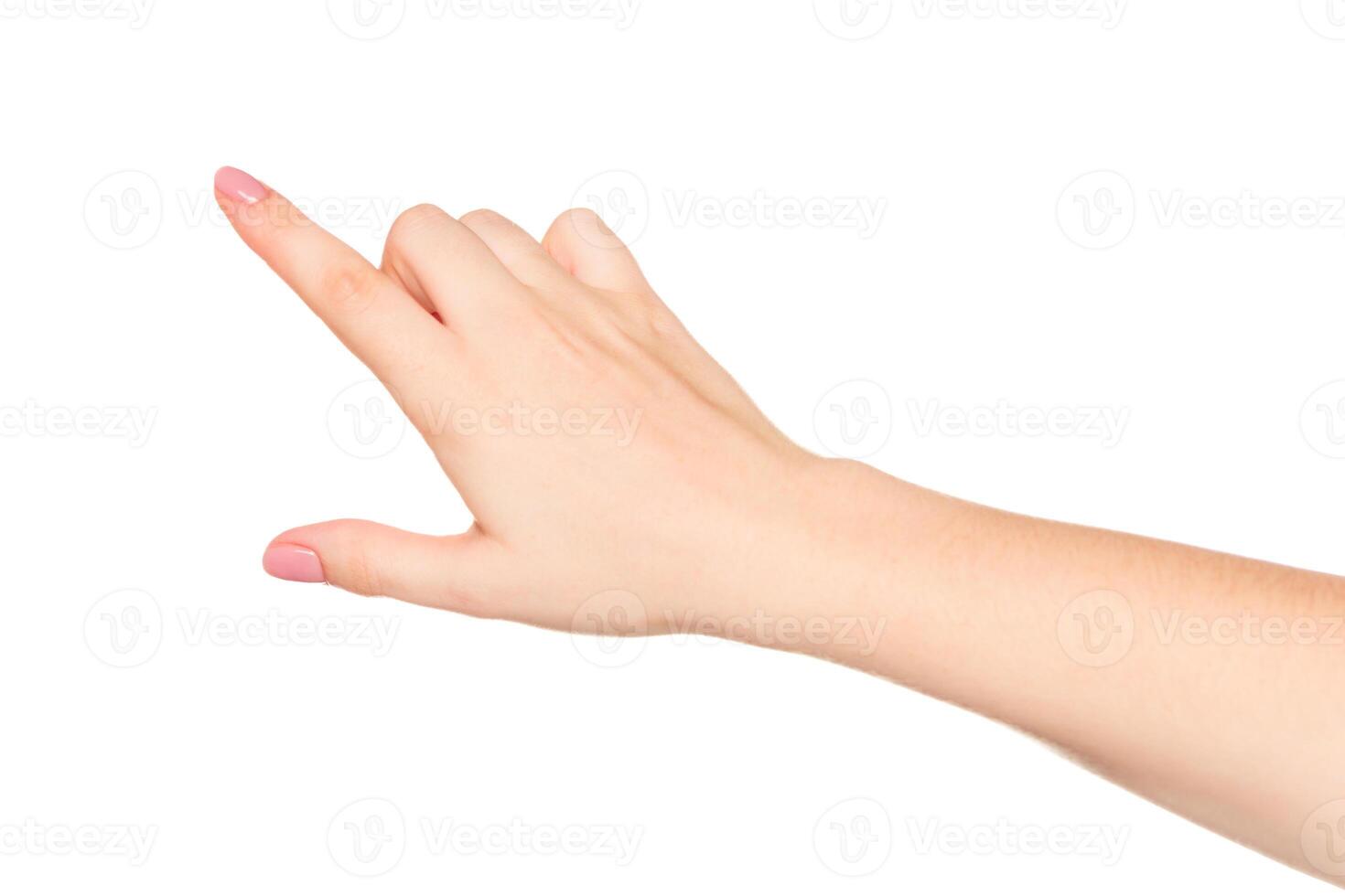 Hand pointing to the right against a plain white background indicating direction and focus photo