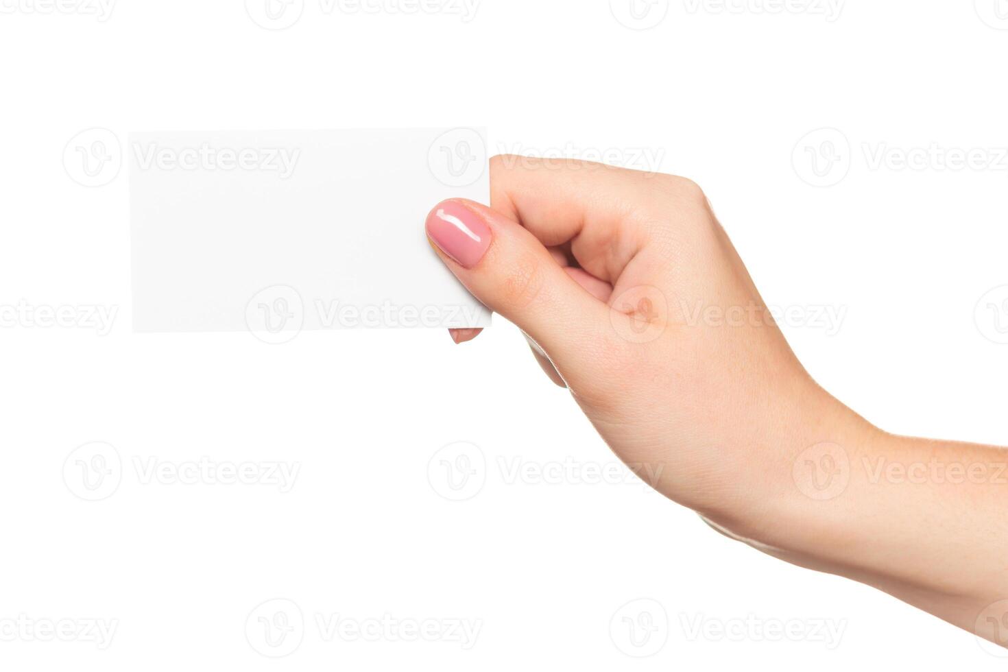 Hand holding a blank card against a white background, illustrating customization or design possibilities photo