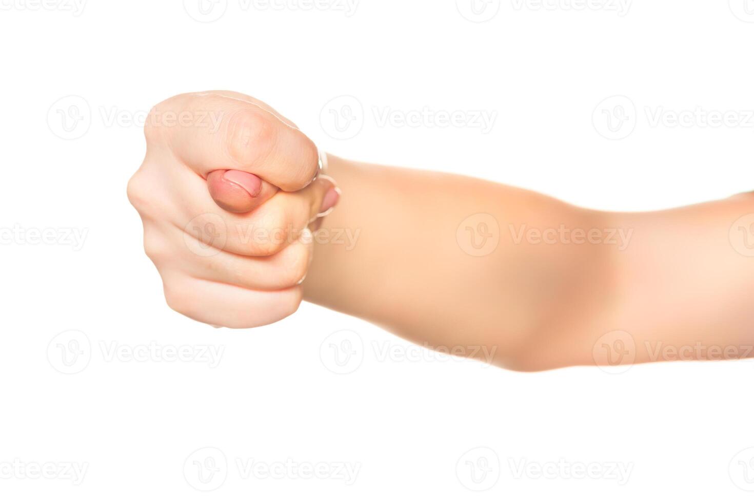 Fist clenching gesture demonstrates determination and strength in a clear, focused manner photo