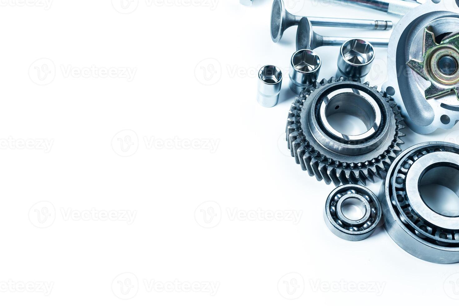 Mechanic workshop display featuring various engine parts and tools often used in automotive repairs or maintenance photo