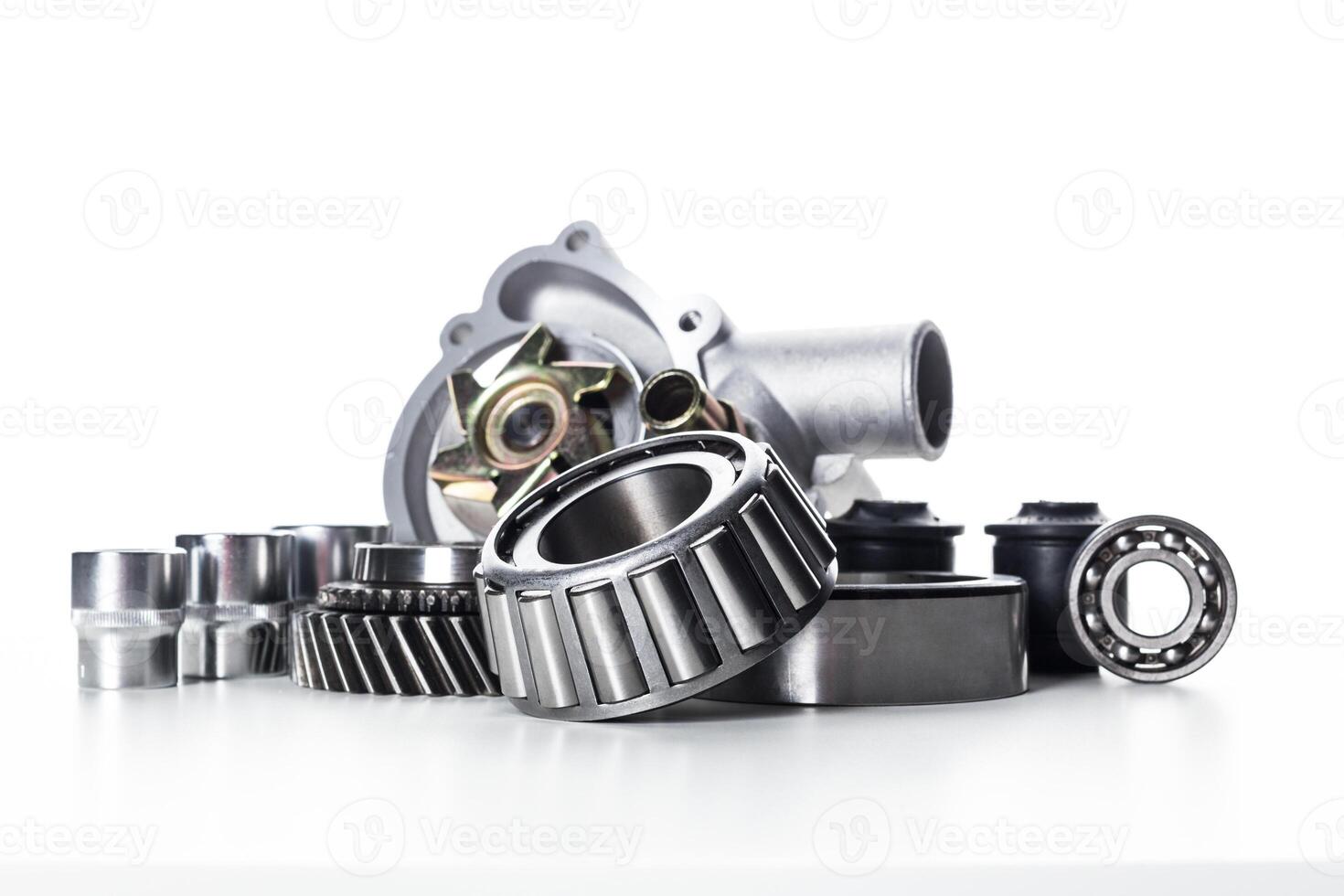 Engine components arranged aesthetically on a clean surface showcasing their intricate designs and functionalities photo