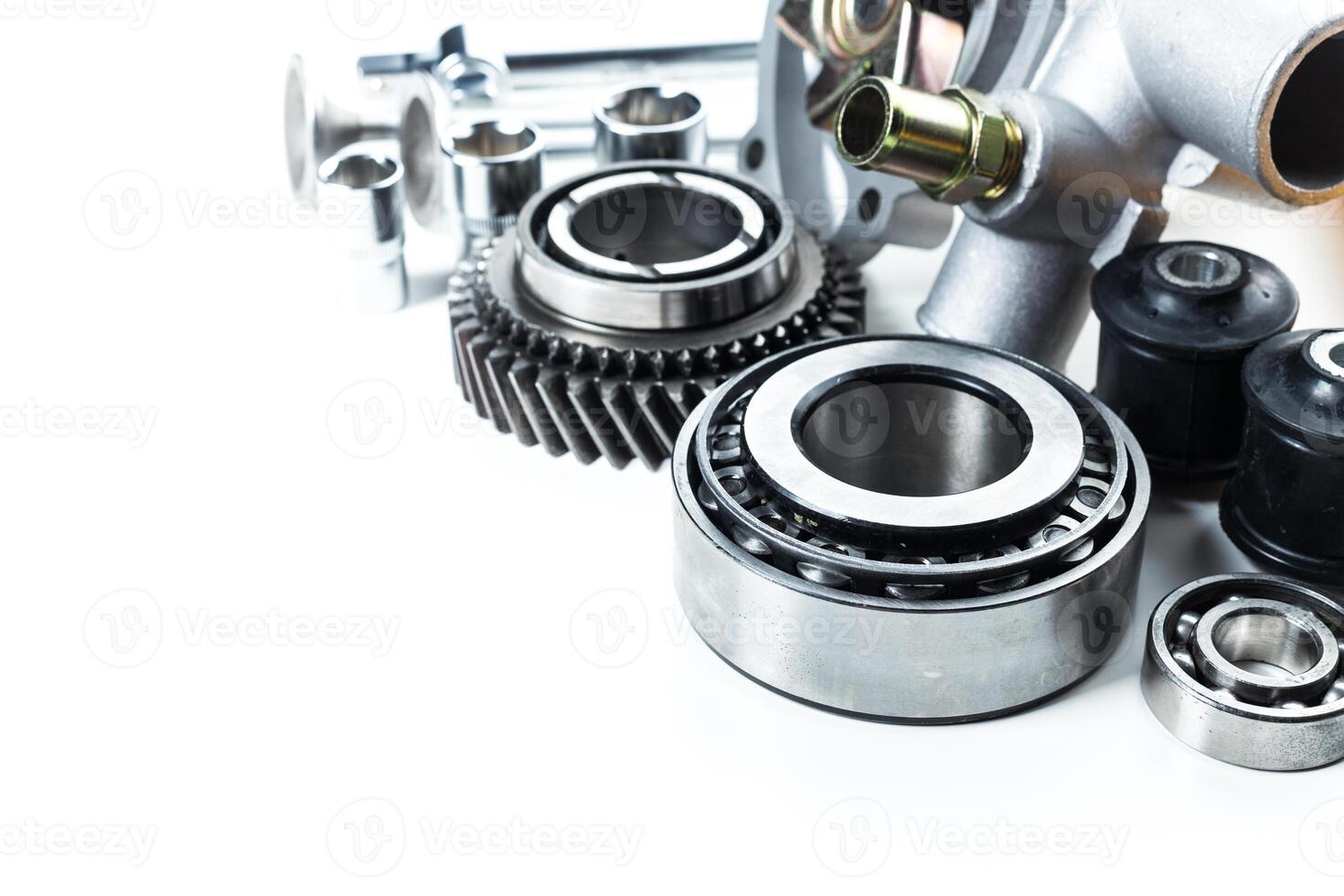 Capture of various mechanical parts on a white background highlighting precision engineering components and industrial design photo