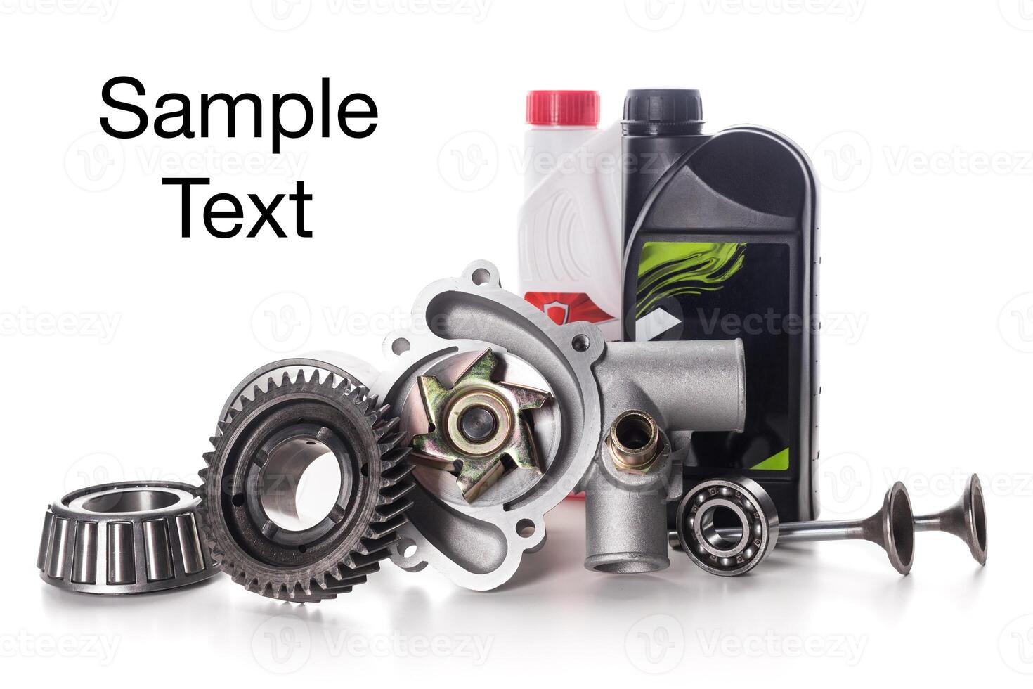 Assorted automotive parts and fluids arranged artistically on a light background photo