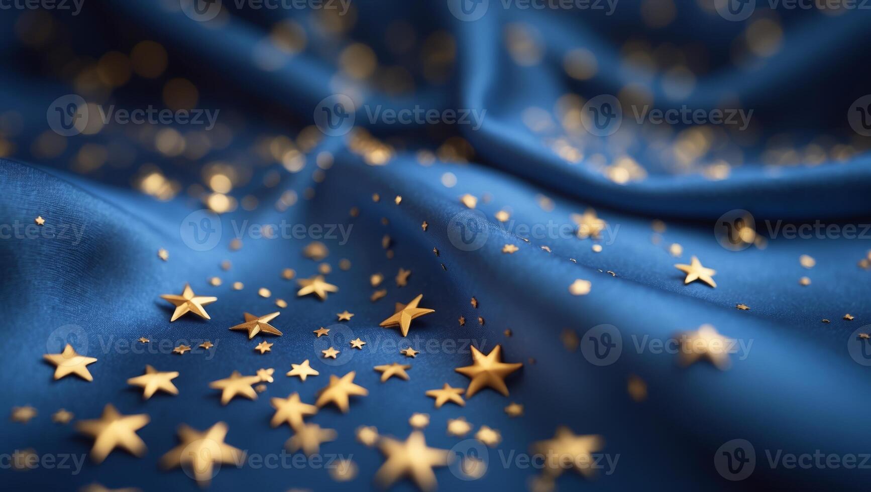 Golden stars scattered on deep blue fabric creating a whimsical and elegant atmosphere during an evening celebration photo