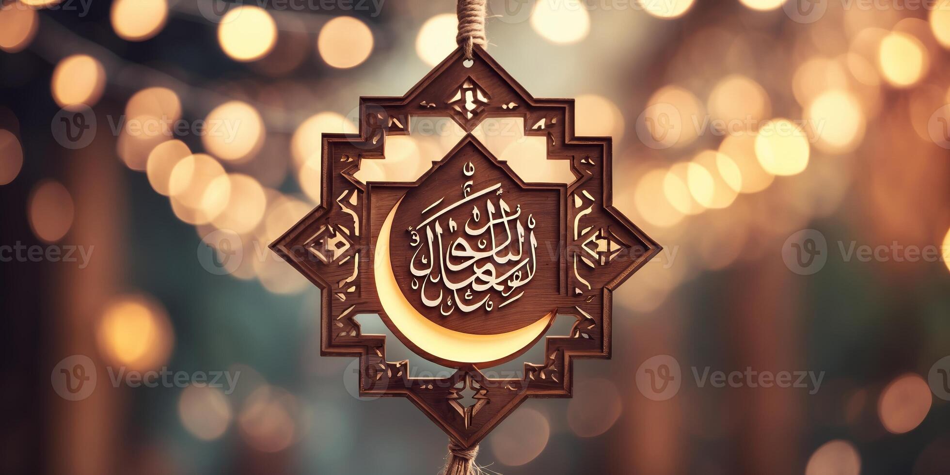 Elegant crescent moon ornament with intricate calligraphy illuminated by soft lights during a nighttime celebration photo