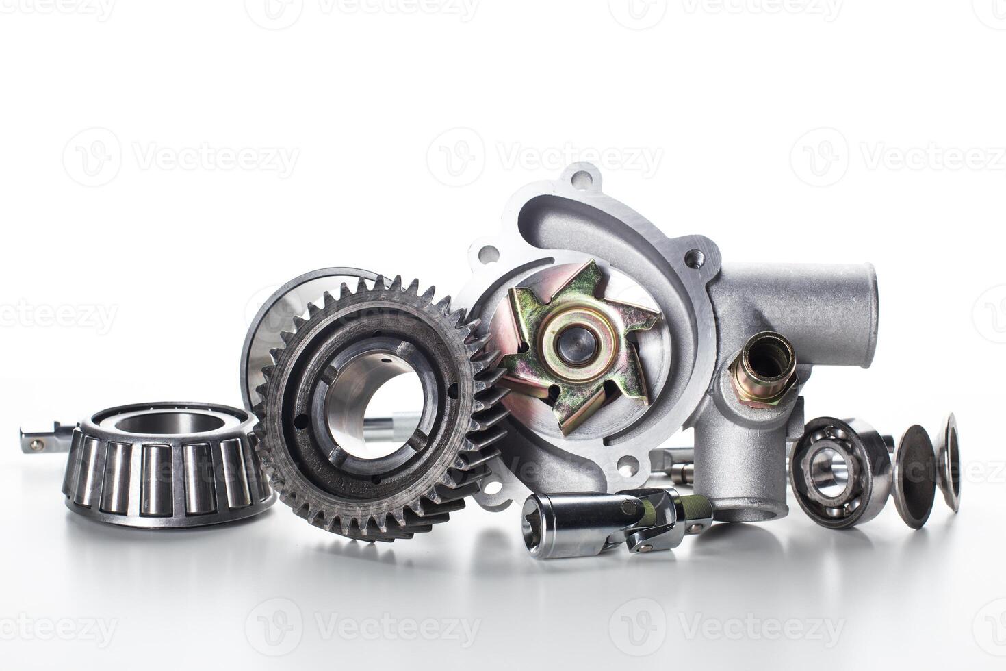 Collection of automotive mechanical components displayed artfully on a light background photo