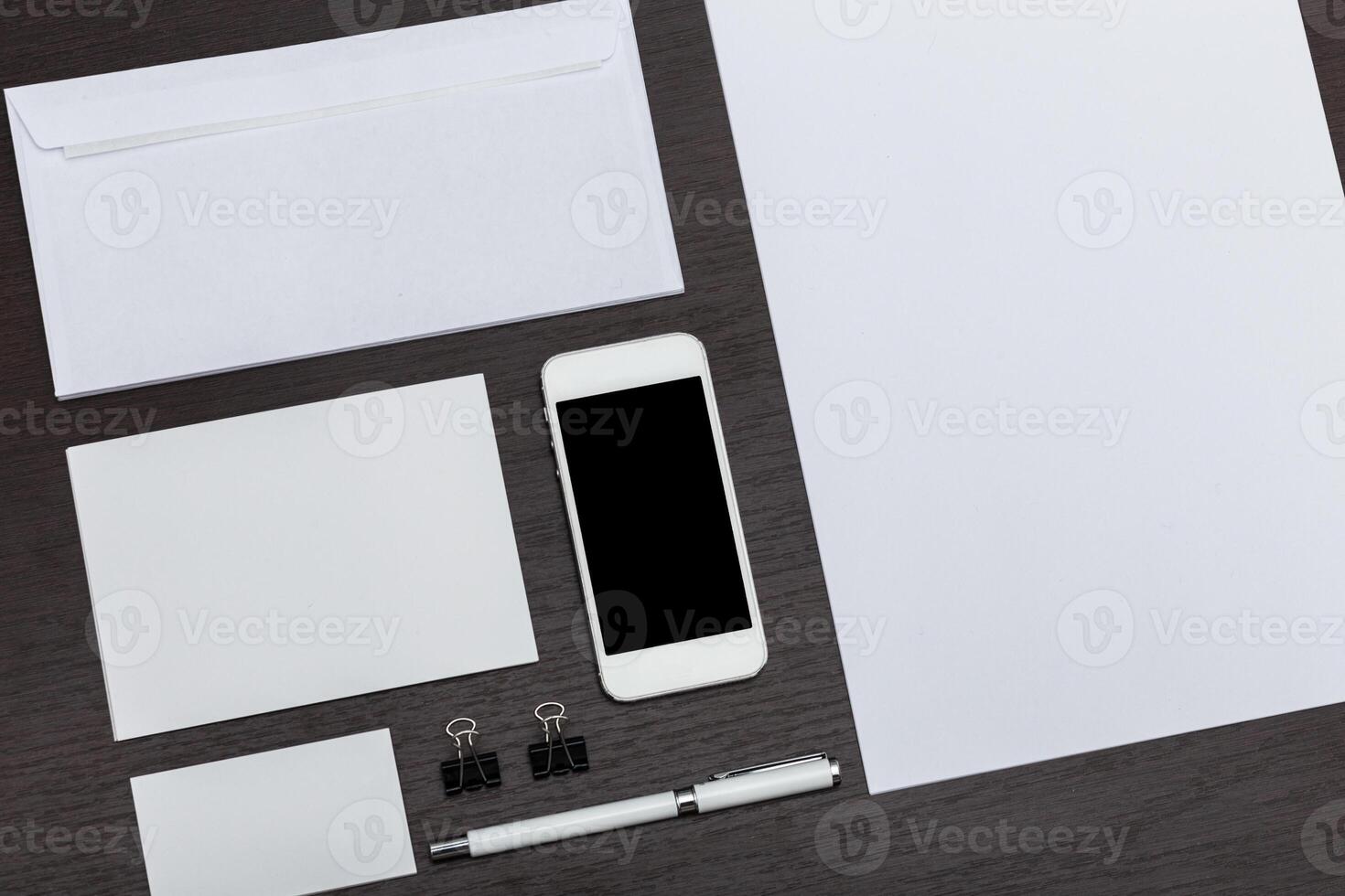 Office workspace with stationery items on a wooden table, showcasing organization and minimalism photo