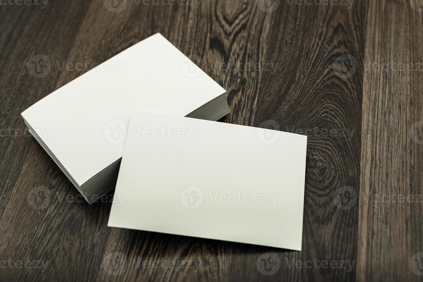 Blank notecards and a wooden surface showcasing a minimalist workspace ideal for creative writing and brainstorming photo