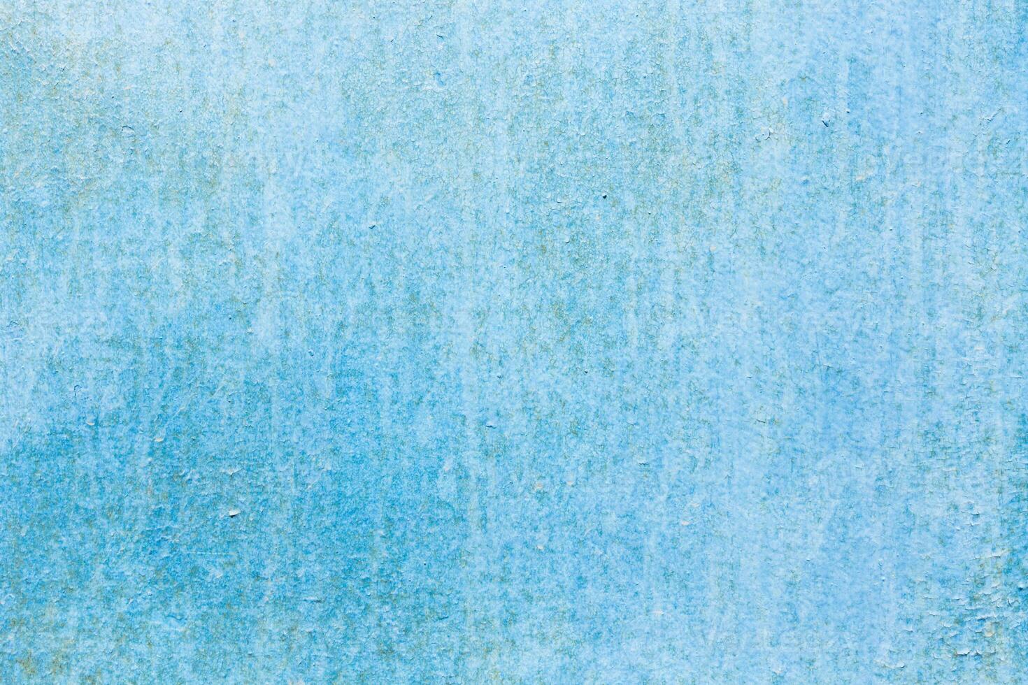 Textured blue background with subtle variations in tone and appearance creates a calming ambiance perfect for art or design projects photo