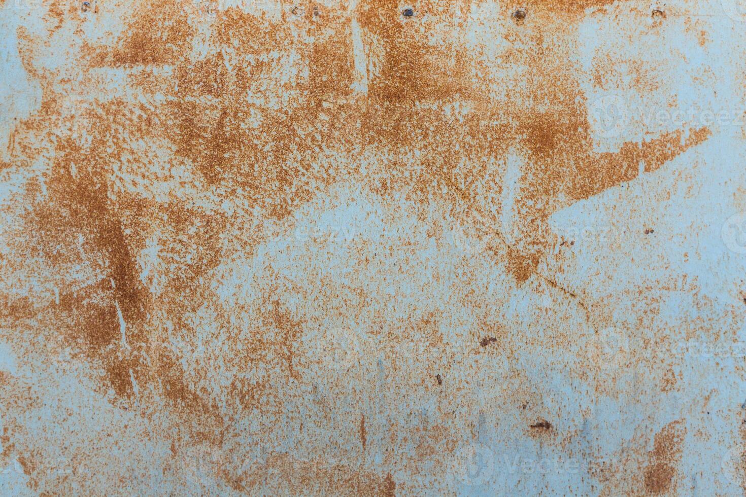 Textured background featuring rust and weathered elements in an industrial setting photo