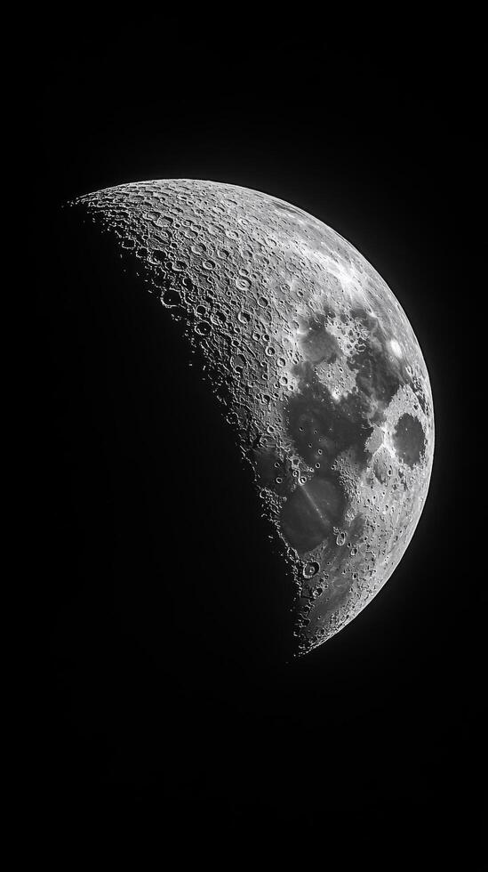 Moon phase over a lunar landscape captured in detailed black and white photo