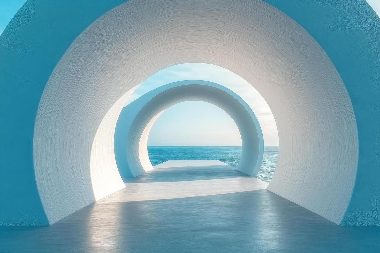 A tunnel with white walls and blue sky photo