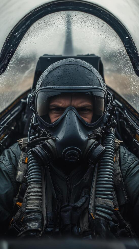 A man in a fighter jet with a mask on photo
