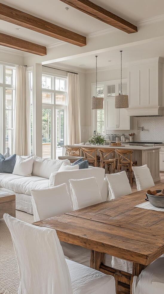 A large open living room with a dining table and chairs photo