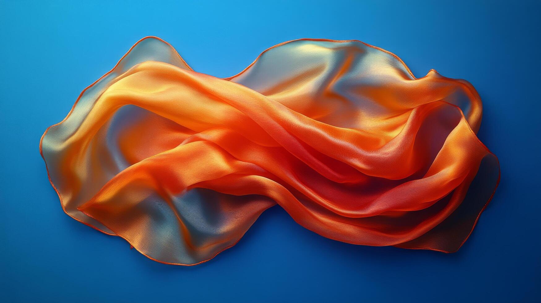 An orange and blue fabric on a blue background photo