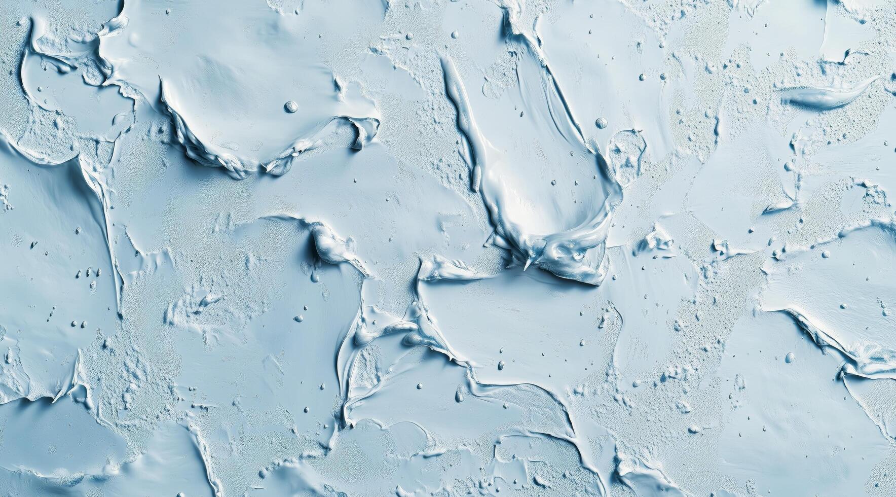 Textured blue surface with abstract patterns created by layered material during artistic application photo