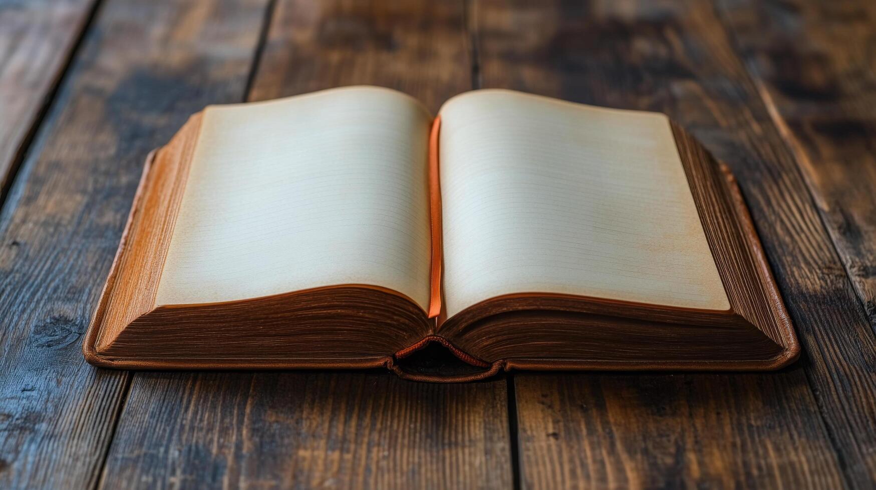 An open book on a wooden table photo