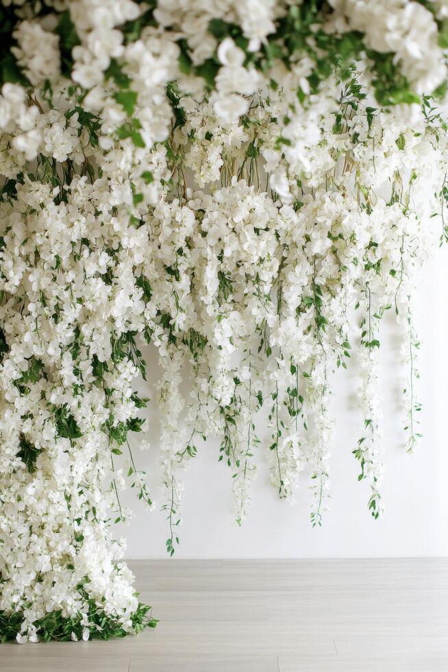 A white wall covered in white flowers photo