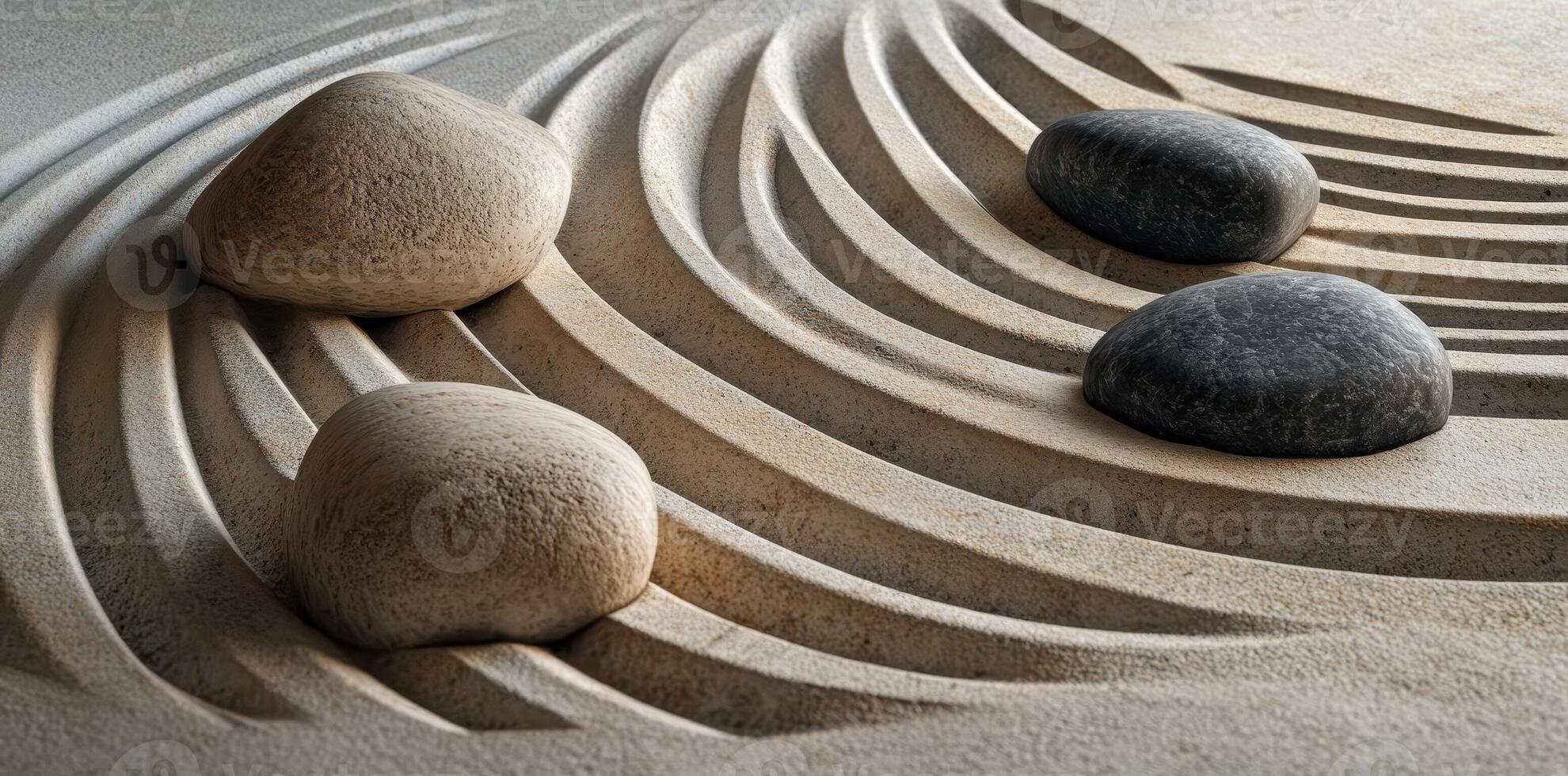 Serene zen garden with rocks and raked sand pattern photo