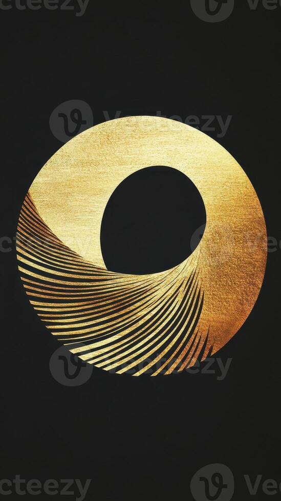 Abstract golden circle with linear patterns on a black background photo