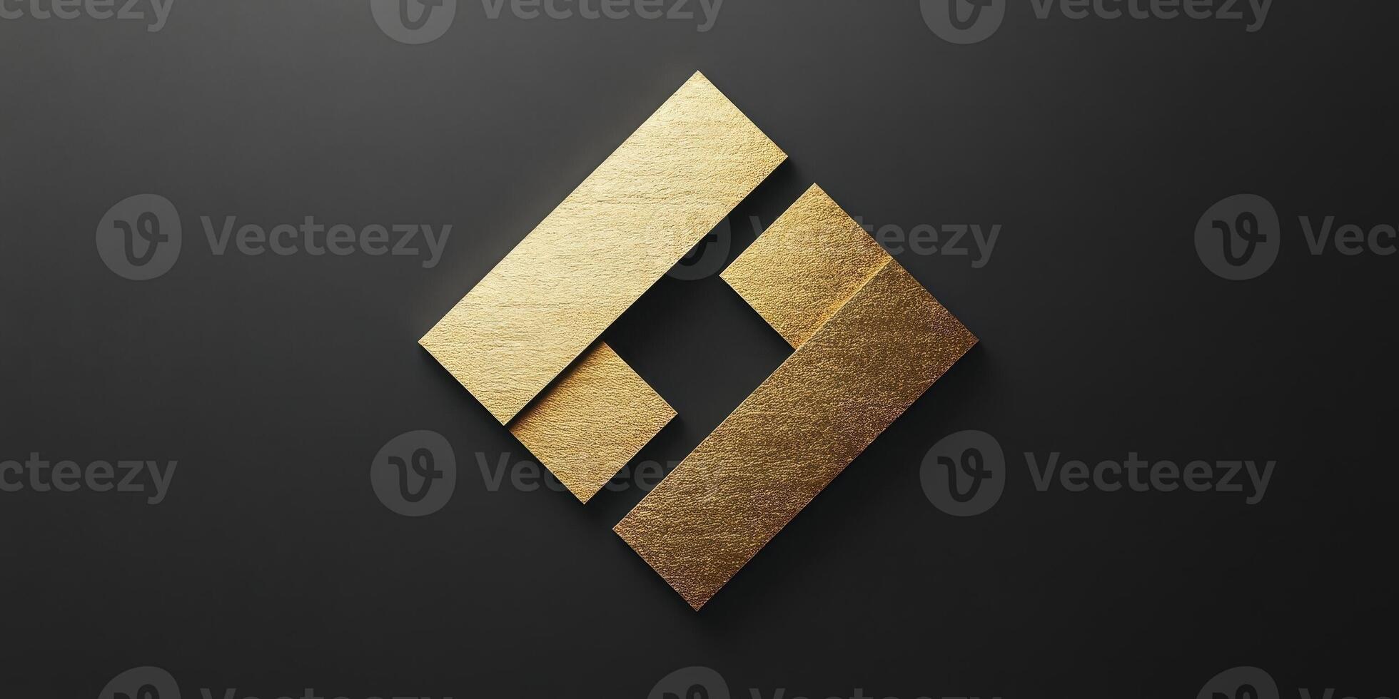 Golden geometric logo design on a dark gray background photo