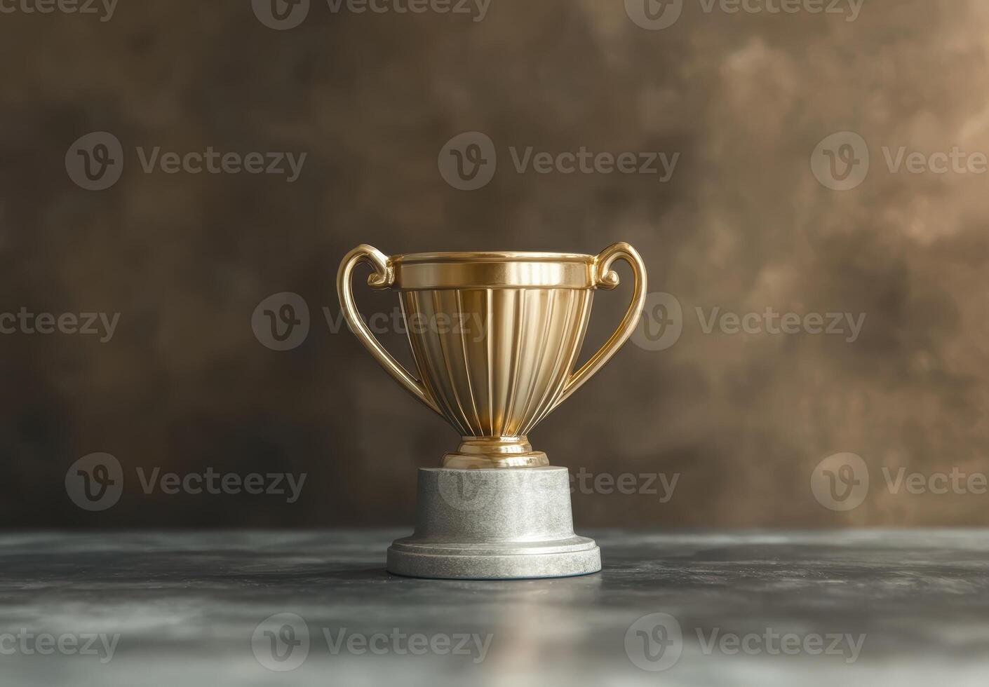 Golden trophy on a marble surface photo