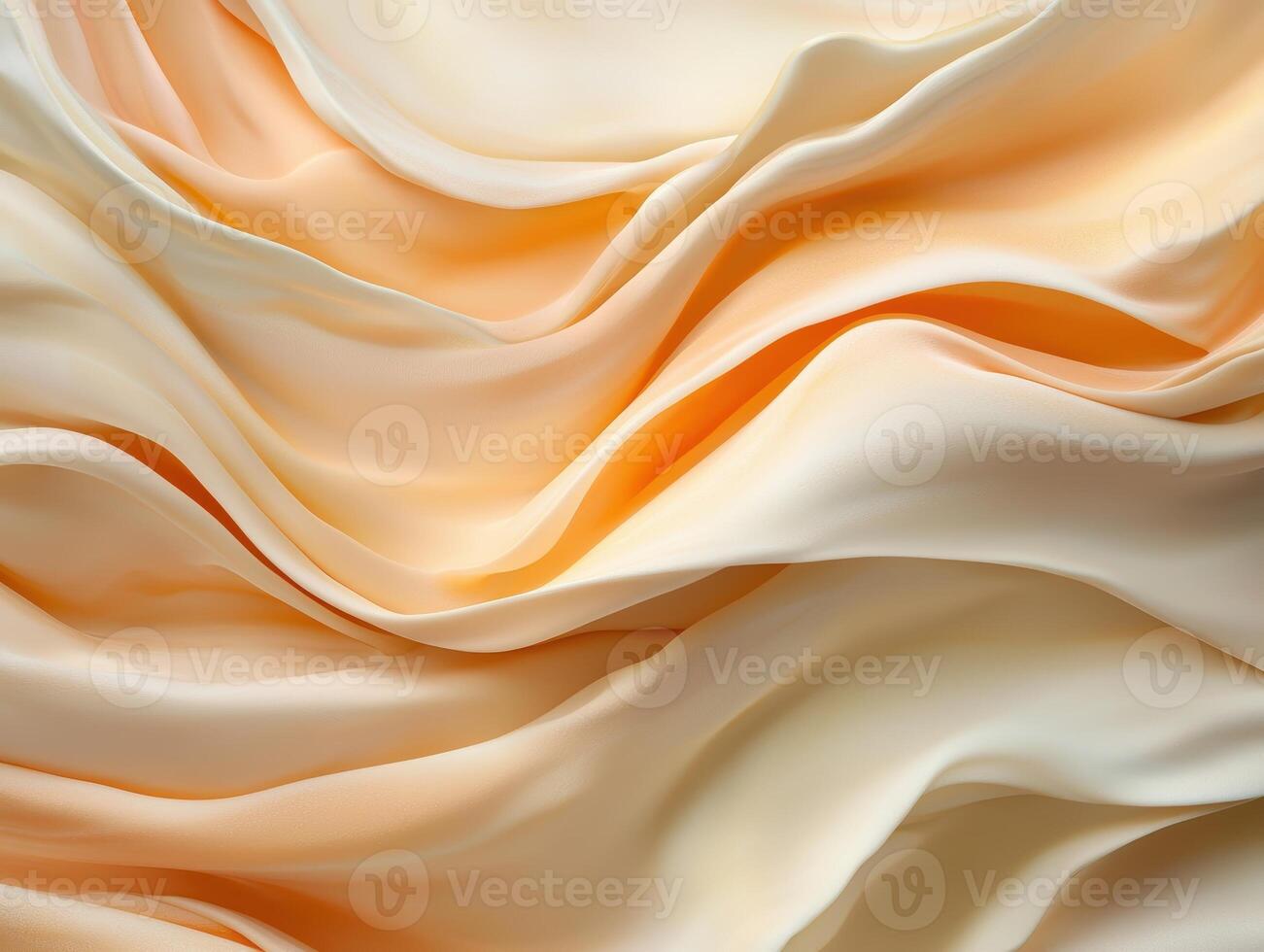Abstract flowing fabric background with soft peach and cream colors photo