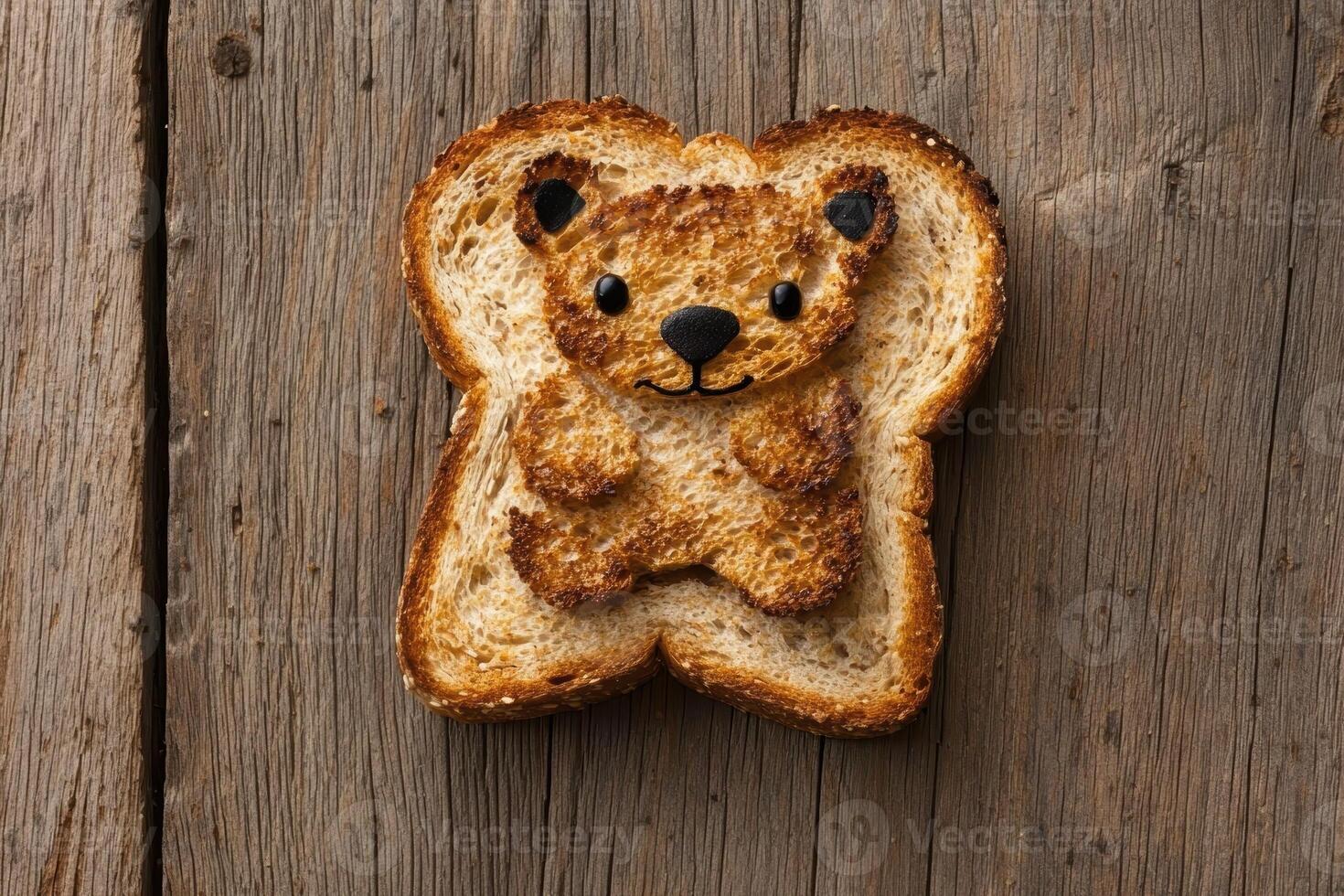 Teddy bear toast on wooden background, a fun breakfast for kids photo