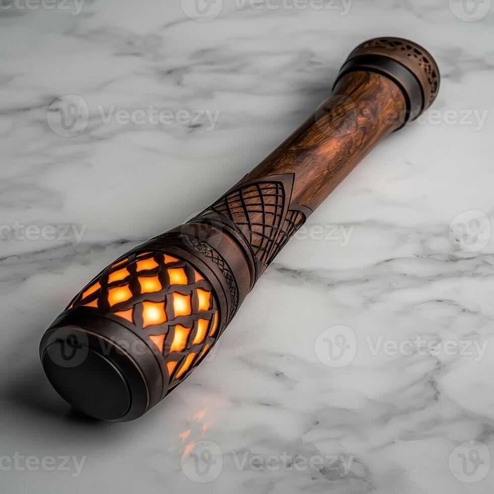 An ornate wooden decorative lamp on a marble surface photo