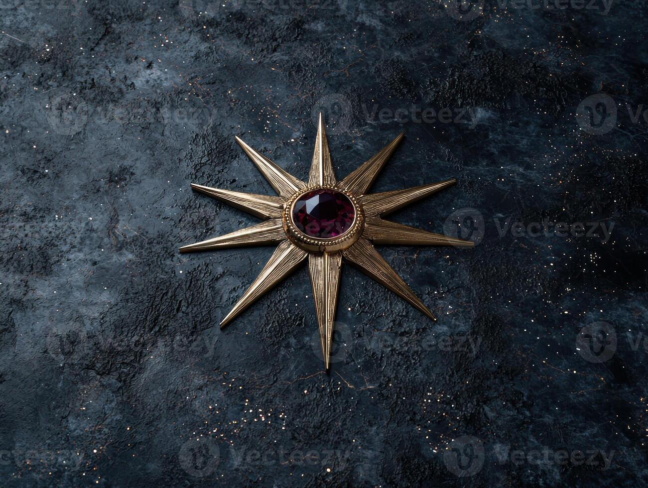Golden star with purple gem on dark textured background photo
