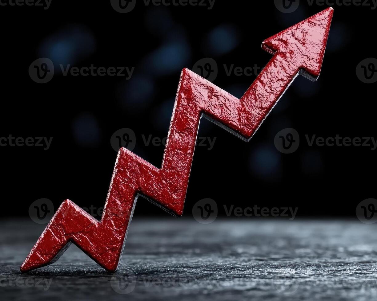 Red arrow pointing upwards, representing growth and success photo