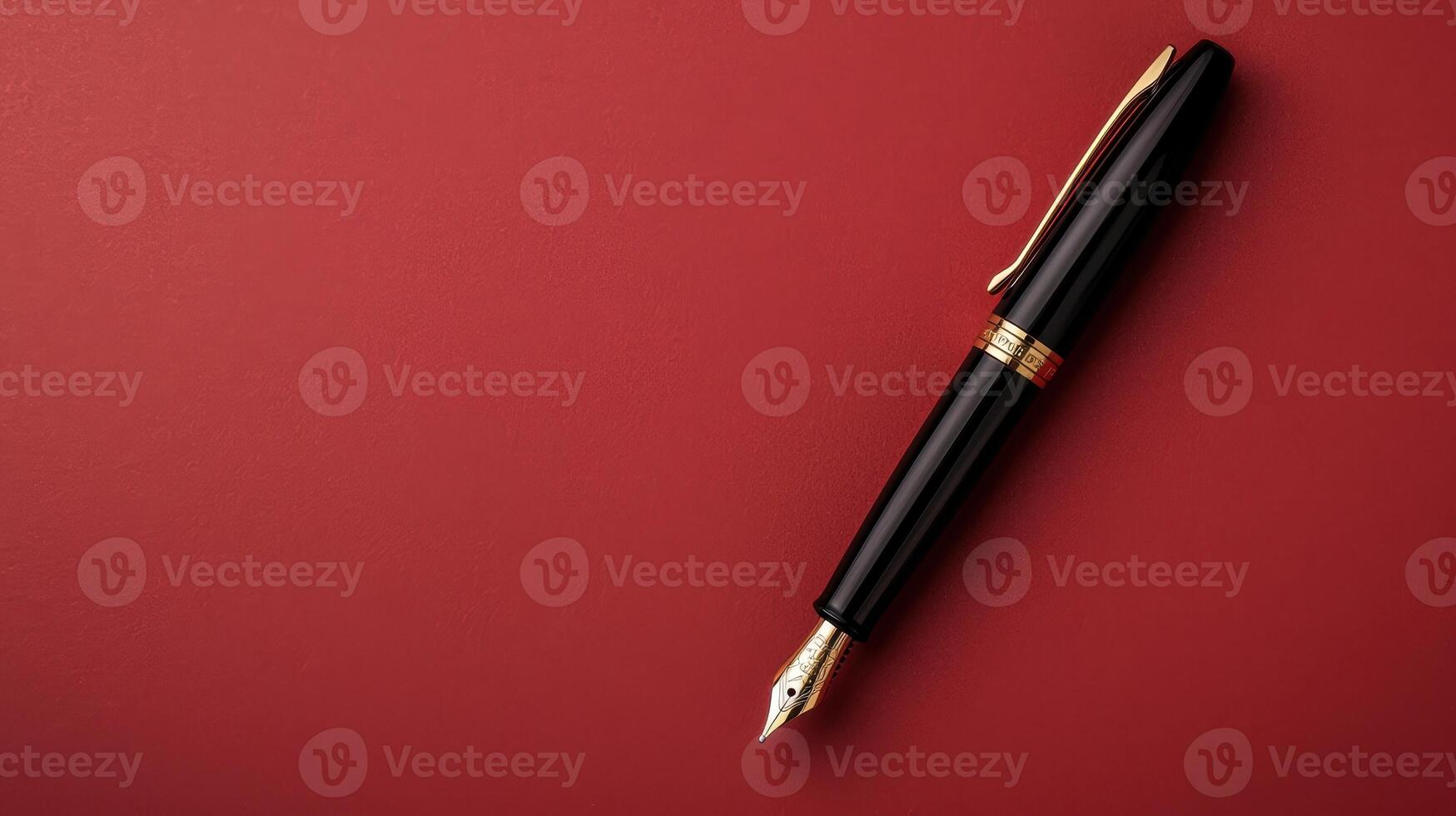 Elegant fountain pen on a red background photo