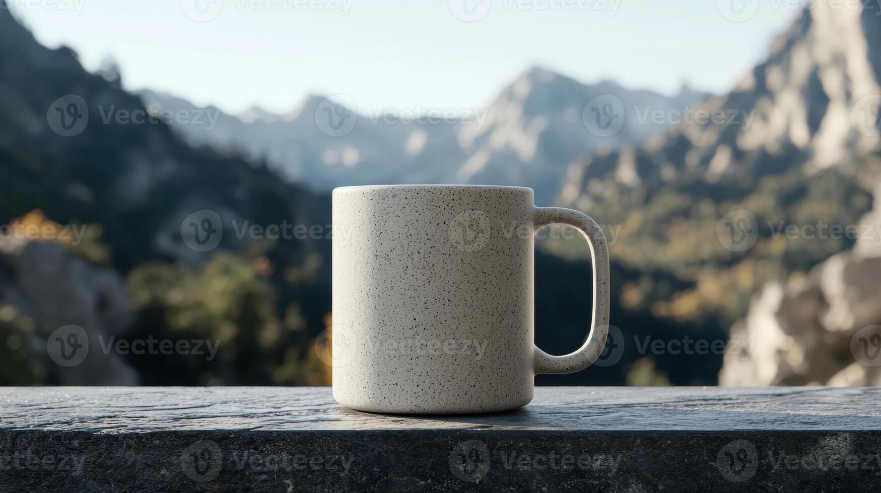 A speckled mug sits on a stone surface with a mountain backdrop photo