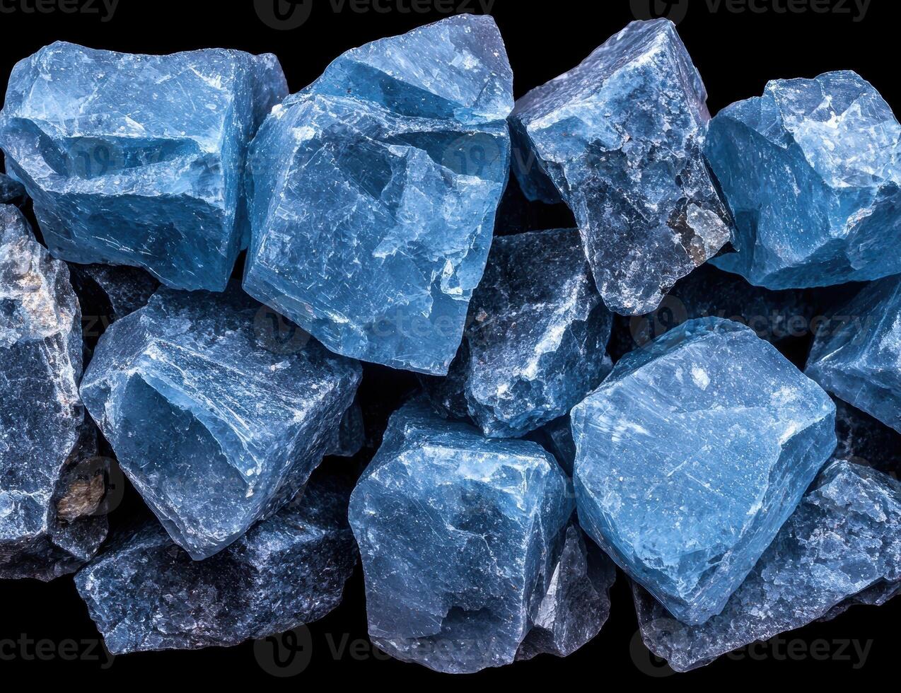 Pile of rough blue gemstones photo