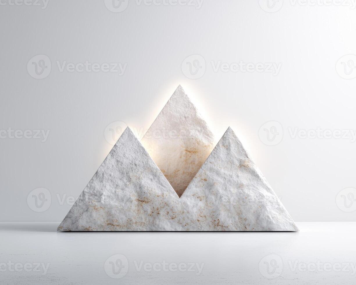 Three stone triangles arranged in a minimalist composition photo