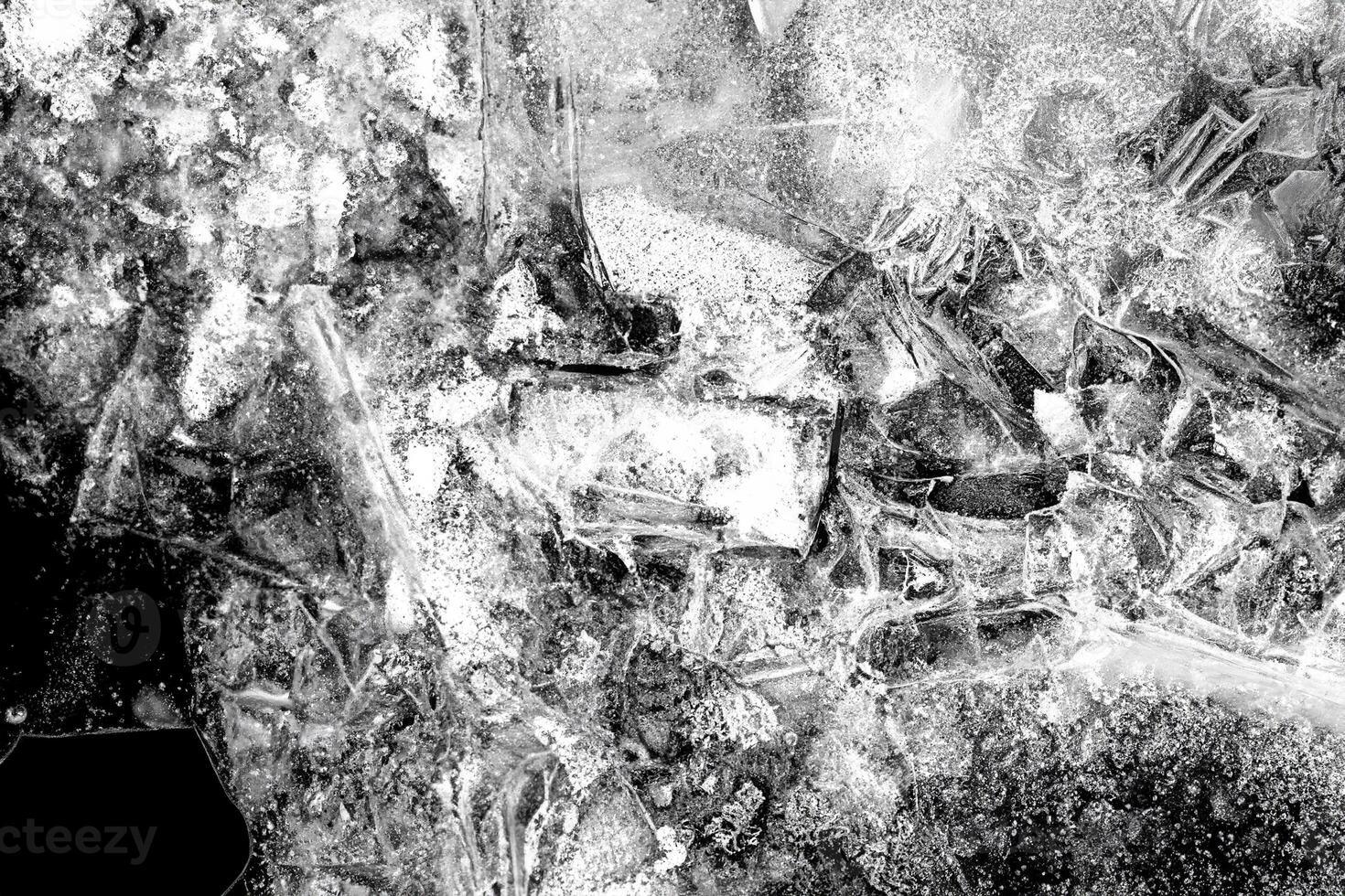 Black and white abstract ice texture with intricate patterns and frosty, crystallized details. photo