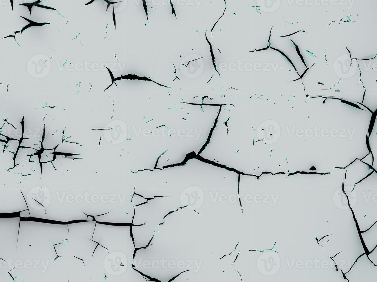 Abstract texture featuring a cracked and weathered surface with irregular black lines on a light background. photo