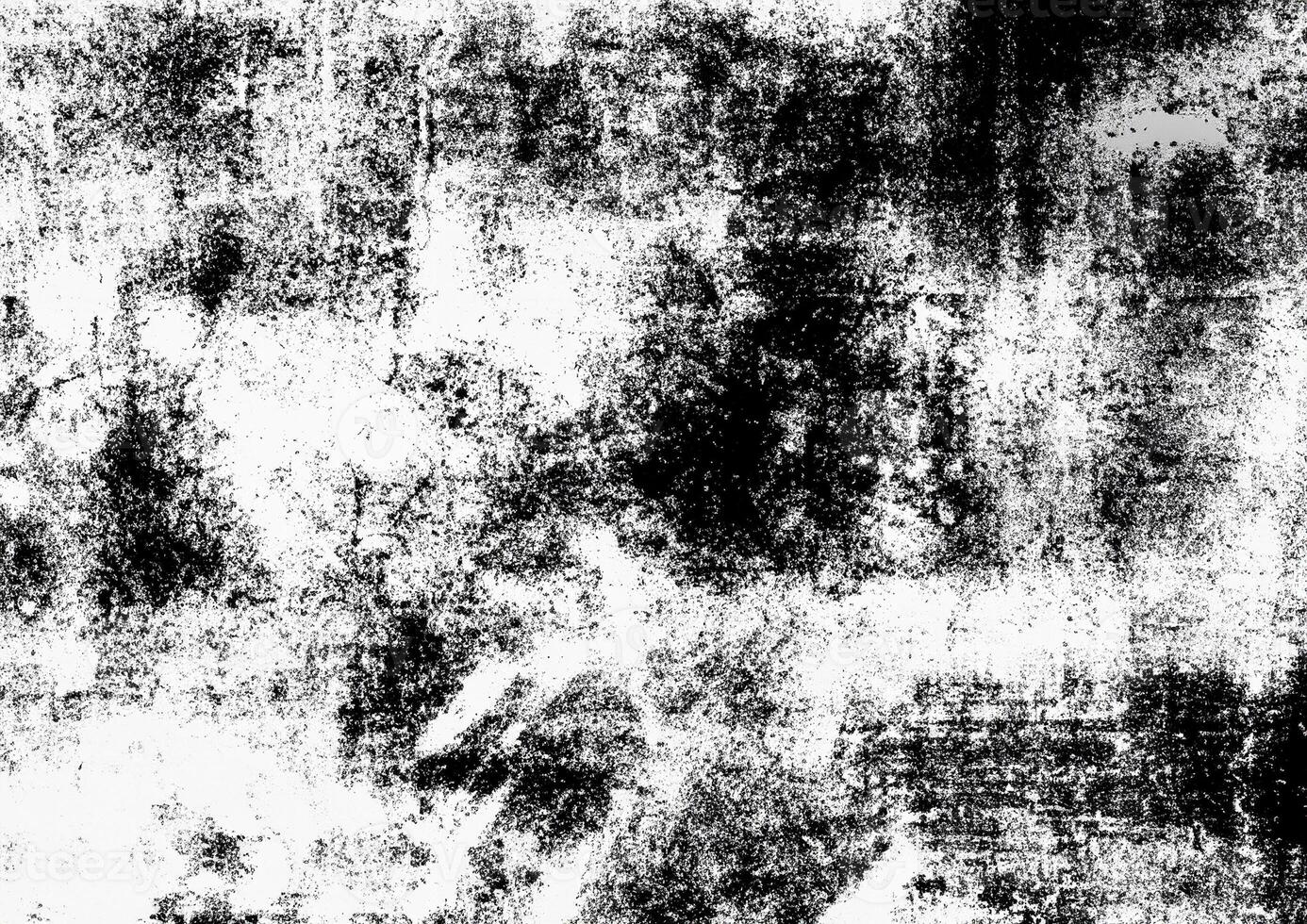 High-contrast black and white grunge texture with distressed and rough patterns, ideal for overlays. photo